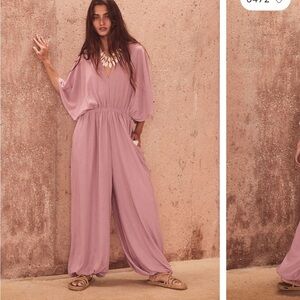 Free People Jumpsuit. Brand new with tags. Never worn